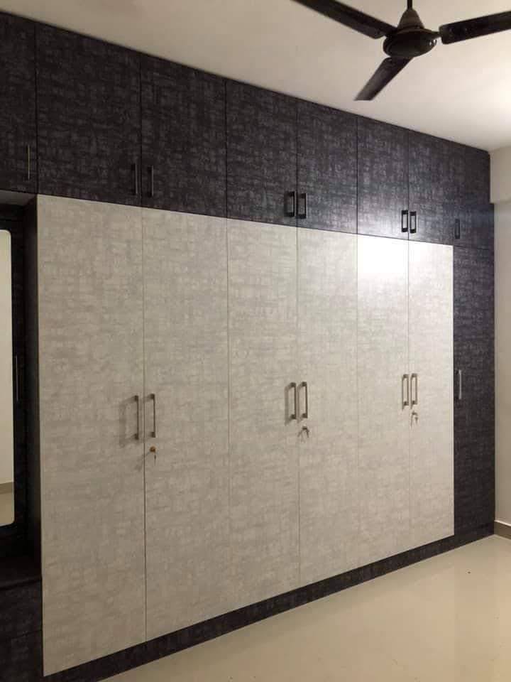 Backlit CNC Floral Jaali Wall Screen on Dark Smoked Oak Panelling - Execution #